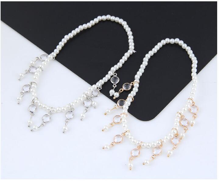 Pearlé Tassel